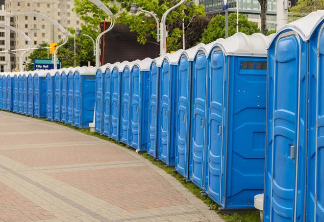 a row of portable restrooms ready for eventgoers in Bow Mar CO